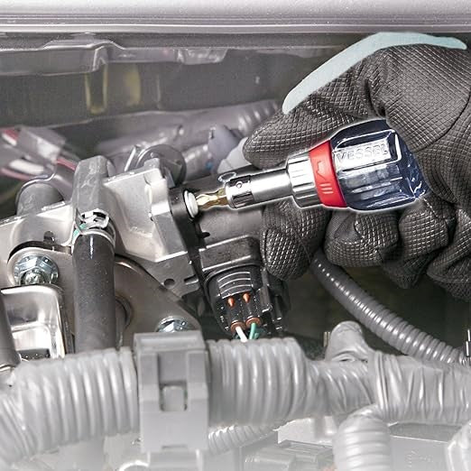 Vessel Ratchet Stubby Screwdriver TD-6700W-23 PH2/3 77mm being used in a car engine bay